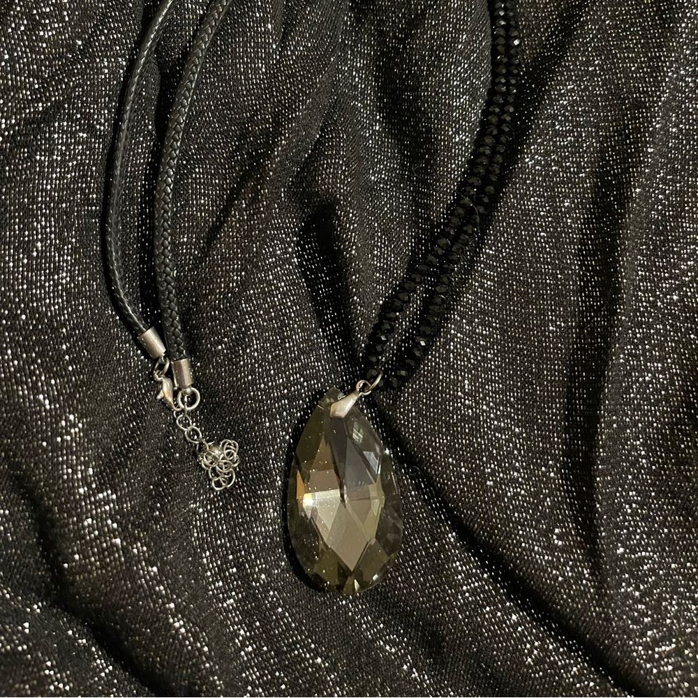 Beautiful 🤩 long necklace with an exquisite smokey-black pendant.